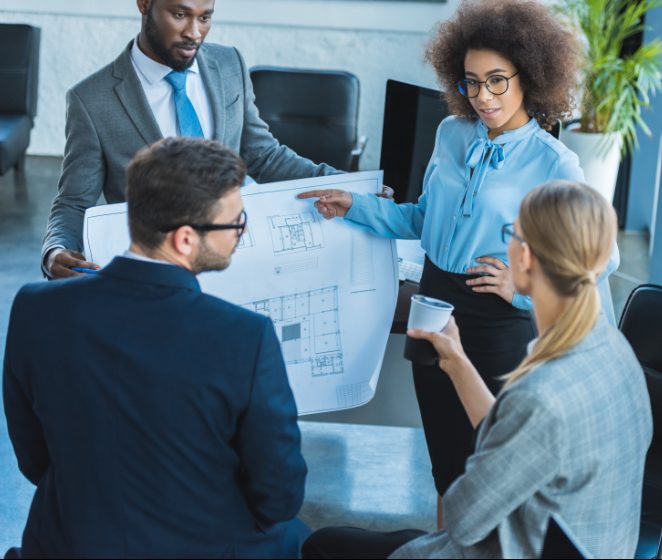 Group of business people discussing real estate development